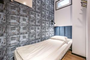 Postel nebo postele na pokoji v ubytování Vola Hostel