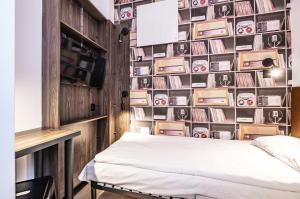 Postel nebo postele na pokoji v ubytování Vola Hostel