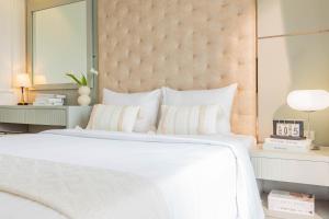 Voodi või voodid majutusasutuse Keypad Hotel - Nhân Hòa toas