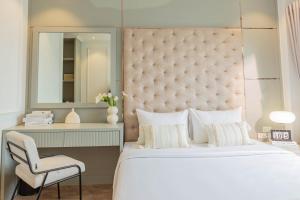 Voodi või voodid majutusasutuse Keypad Hotel - Nhân Hòa toas