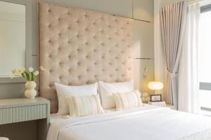 Voodi või voodid majutusasutuse Keypad Hotel - Nhân Hòa toas