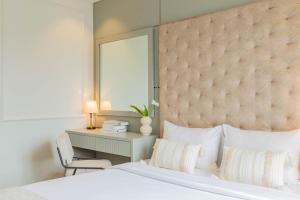 Voodi või voodid majutusasutuse Keypad Hotel - Nhân Hòa toas