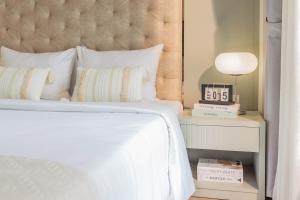 Voodi või voodid majutusasutuse Keypad Hotel - Nhân Hòa toas