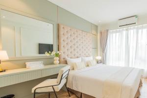Voodi või voodid majutusasutuse Keypad Hotel - Nhân Hòa toas