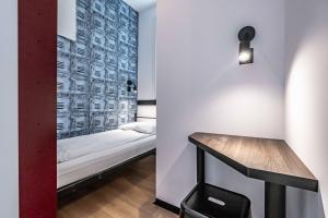Postel nebo postele na pokoji v ubytování Vola Hostel