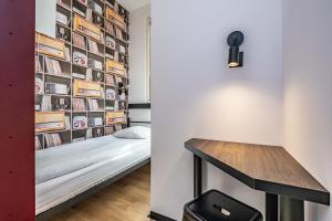 Postel nebo postele na pokoji v ubytování Vola Hostel
