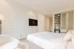 Voodi või voodid majutusasutuse Keypad Hotel - Nhân Hòa toas