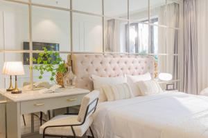 Voodi või voodid majutusasutuse Keypad Hotel - Nhân Hòa toas