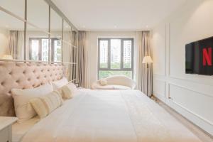 Voodi või voodid majutusasutuse Keypad Hotel - Nhân Hòa toas