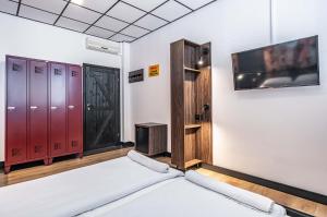 Postel nebo postele na pokoji v ubytování Vola Hostel
