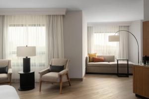Postel nebo postele na pokoji v ubytování Fort Collins Marriott