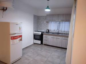 Η κουζίνα ή μικρή κουζίνα στο Casita del Sol