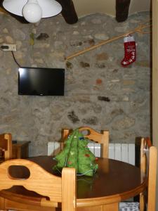 TV a/nebo společenská místnost v ubytování Casa Enduella