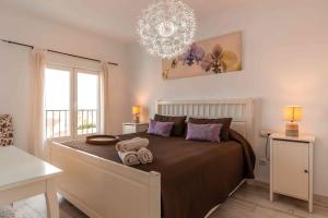 Posteľ alebo postele v izbe v ubytovaní Atico deluxe en el centro by Lets Malaga