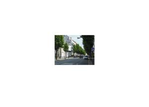 a view of a street with trees and buildings at Unsejouranantes - Gîte Lamoricière in Nantes
