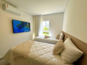 Postel nebo postele na pokoji v ubytování CasaDPraiaNaluum + 56 fotografií