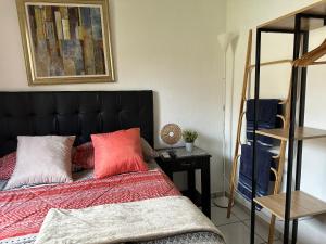 En eller flere senge i et værelse på Apartamento entero Rebeca house