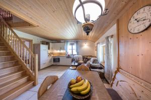 a dining room with a table with bananas on it at Mühlberger Hof in Petting