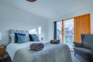 Postel nebo postele na pokoji v ubytování Stay Yorkshire City Centre Apartments