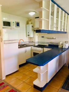 Kuchyň nebo kuchyňský kout v ubytování Departamento en Algarrobo