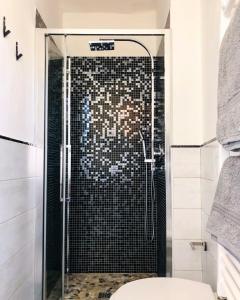 Koupelna v ubytování Via Emilia House - By AyDesHouse