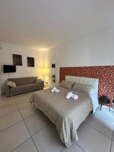 Postel nebo postele na pokoji v ubytování Il Tenore B&B