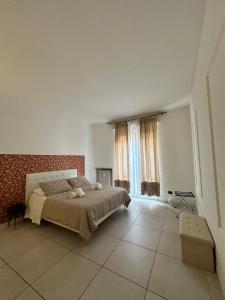 Postel nebo postele na pokoji v ubytování Il Tenore B&B