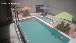 Bazén v ubytování Hotel La Laguna nebo v jeho okolí