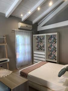 Postel nebo postele na pokoji v ubytování Casa Mabèl