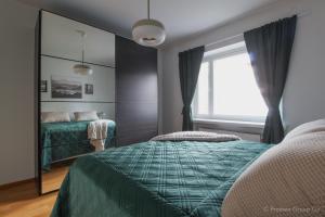 Ένα ή περισσότερα κρεβάτια σε δωμάτιο στο Pramea Apartments Toripiha