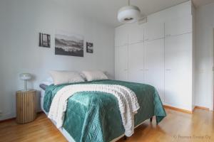 Ένα ή περισσότερα κρεβάτια σε δωμάτιο στο Pramea Apartments Toripiha +17 φωτογραφίες