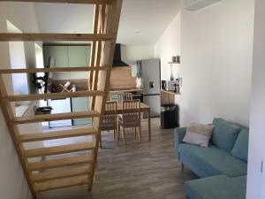 Posezení v ubytování Logement de Tiphanie et Quentin