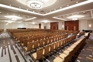 an empty room with rows of chairs in a hall at Delta Hotels by Marriott Ottawa City Centre in Ottawa +57 photos