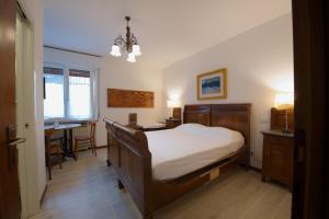 Postel nebo postele na pokoji v ubytování B&B Better Verona