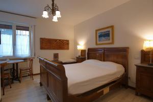Postel nebo postele na pokoji v ubytování B&B Better Verona