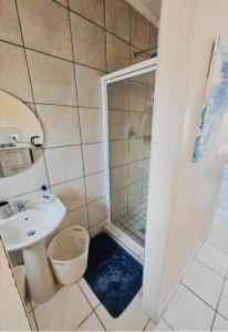Ένα μπάνιο στο Blue Unit Haven at Sea Breeze Manor +22 φωτογραφίες