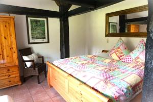 Postel nebo postele na pokoji v ubytování Altes Landhaus Oste mit Grünkohltour & Bossel-Wochenende + 87 fotografií