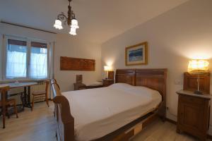 Postel nebo postele na pokoji v ubytování B&B Better Verona