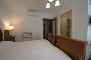 Postel nebo postele na pokoji v ubytování B&B Better Verona
