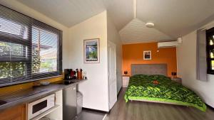 Kuchyň nebo kuchyňský kout v ubytování TAHITI - Domaine Mango Lodge