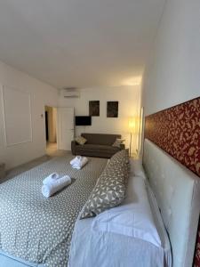 Postel nebo postele na pokoji v ubytování Il Tenore B&B