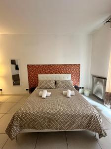 Postel nebo postele na pokoji v ubytování Il Tenore B&B