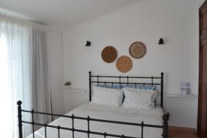 Postel nebo postele na pokoji v ubytování Pátio Camaleónico AL - All Suites + 12 fotografií