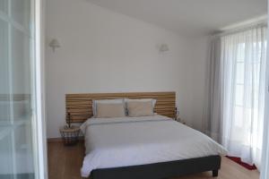 Postel nebo postele na pokoji v ubytování Pátio Camaleónico AL - All Suites