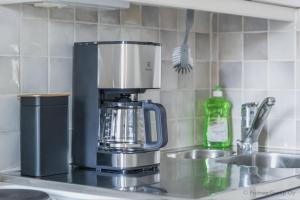 Kuchyň nebo kuchyňský kout v ubytování Pramea Apartments Taukotupa + 7 fotografií
