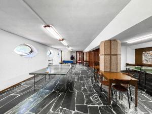 Mynd úr myndasafni af Appartamento sulle piste da SCI con SALA GIOCHI í Temù