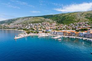an aerial view of a town on a body of water at Apartment Klara in Senj
