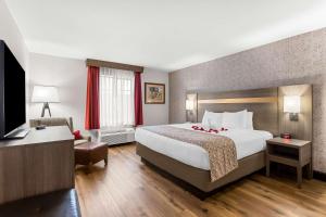 Ένα ή περισσότερα κρεβάτια σε δωμάτιο στο Best Western Moriarty Heritage Inn +23 φωτογραφίες