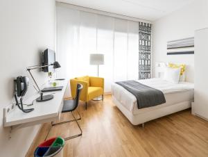 Postel nebo postele na pokoji v ubytování WestCord Hotel Delft