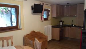 Kuchyň nebo kuchyňský kout v ubytování Maison de Vittor - Cogne + 6 fotografií